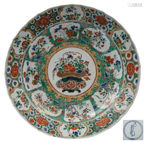A Chinese famille verte charger with shaped rim, painted wit...
