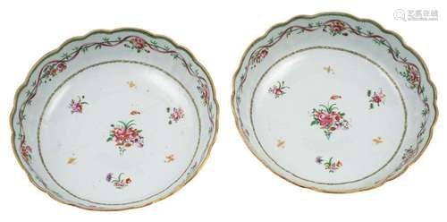 A pair of Chinese famille rose shallow bowls with lobed foli...