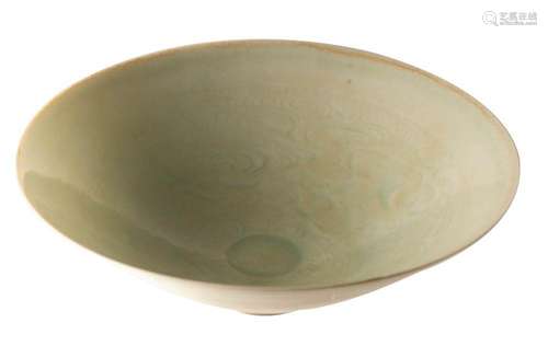 A Chinese celadon glazed bowl, probably Song and of thinly p...