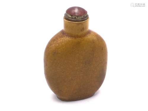 A Chinese yellow crackle glazed snuff bottle with