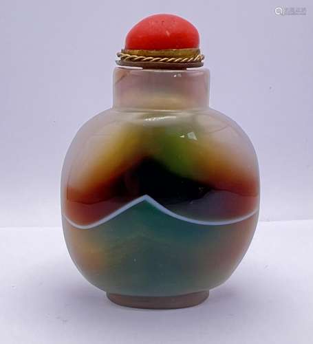 A polished multicoloured banded agate snuff bottle