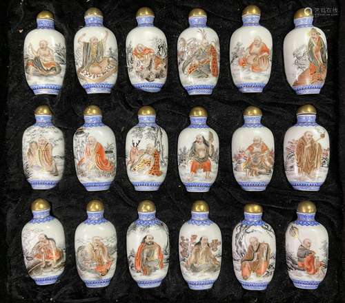 A cased set of 18 hand painted porcelain snuff bot