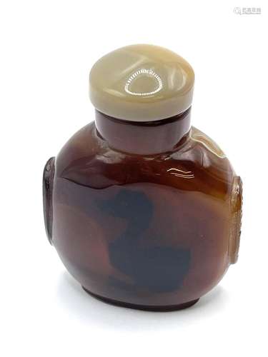 An unusual polished agate bottle with a natural si