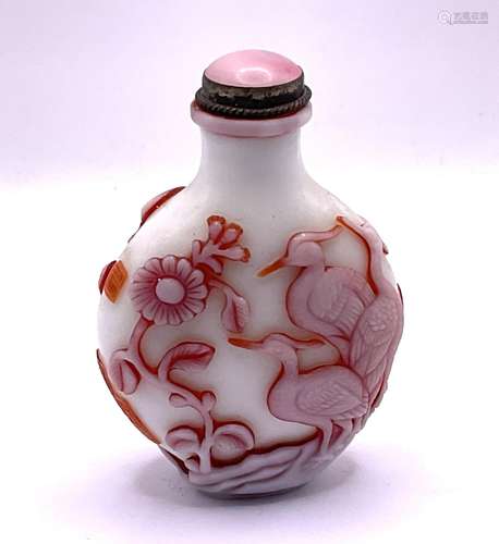 A 2 layered milk glass cameo glass snuff bottle wi