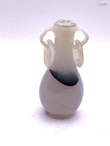 A fine Chinese carved white agate snuff bottle wit