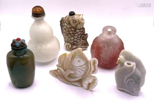 A small collection of snuff bottle using various m