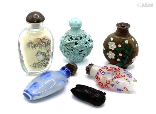 A small collection of snuff bottles to include sma