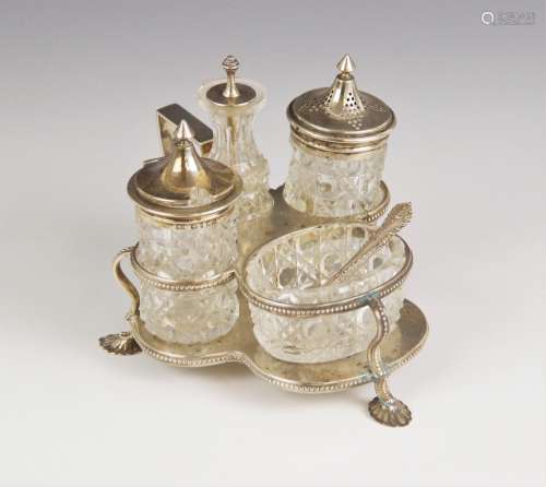 A Victorian cut glass silver mounted cruet set, Henry Manton...