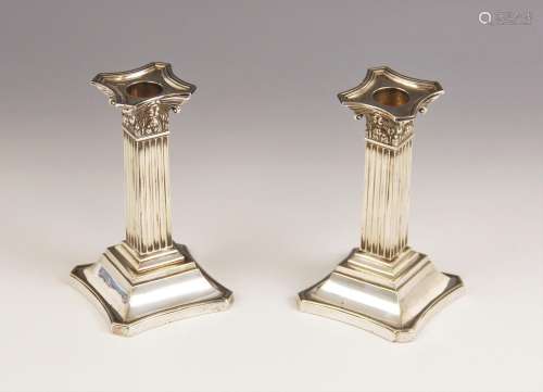 A pair of Victorian silver Corinthian column candlesticks, M...