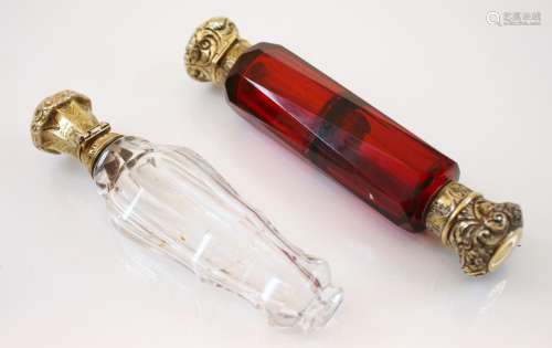 A red glass Victorian scent bottle, the embossed scrolling t...