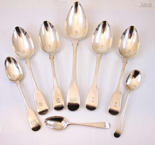 A set of four William IV silver fiddle pattern table spoons,...