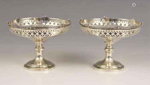 A pair of George V silver pedestal bonbon dishes, probably M...