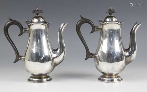 A pair of Edwardian silver bachelors coffee pots, The Alexan...