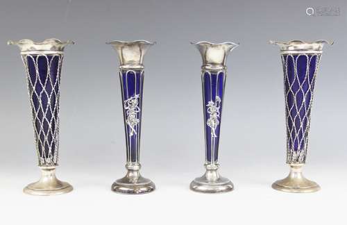 A pair of Edwardian silver posy vases, Thomas Bradbury and S...