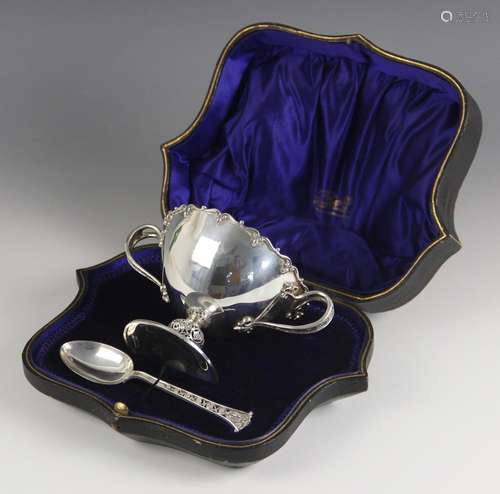 A George V silver cased two handled bowl and spoon, Finnigan...