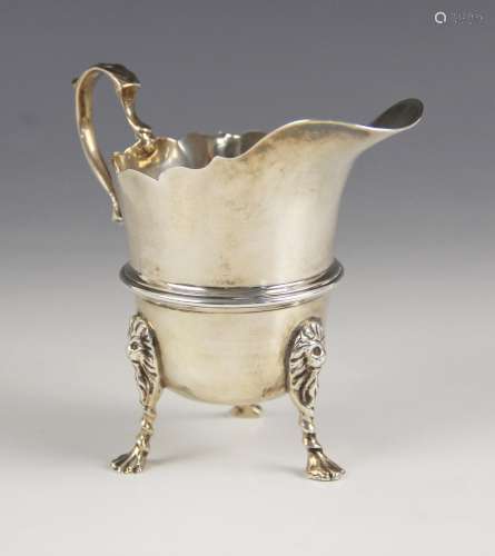 A George V silver cream jug, Wakely & Wheeler, Dublin 19...