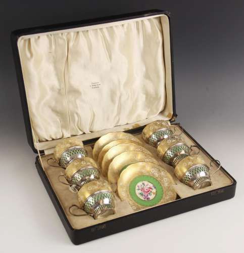 A George V silver mounted cabaret set, Charles S Green and C...