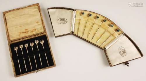 A cased set of George V silver cocktail sticks, Adie Brother...