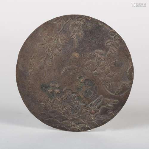 Placa circular o espejo chino realizado en metal