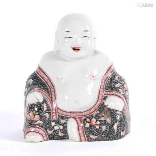 Figura realizada en porcelana representando Buda sonriente. ...