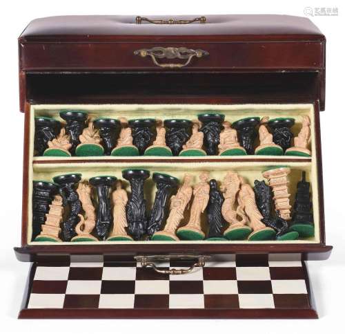 Juego de ajedrez realizado en resina con figuras orientales.