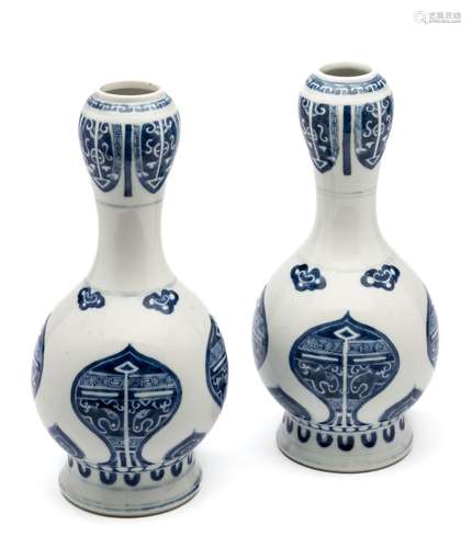 A PAIR OF CHINESE BLUE AND WHITE ARCHAISTIC BOTTLE VASES, 19...