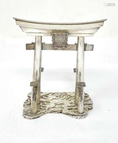 A JAPANESE SILVER MODEL OF A TORII (SHRINE GATEWAY), 20TH CE...