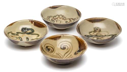 FOUR STONEWARE BOWLS, PROBABLY VIETNAM, 19TH CENTURY OR EARL...