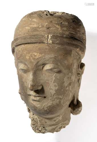 A GANDHARA STUCCO HEAD OF A DEVOTEE, NORTH-WESTERN PAKISTAN,...