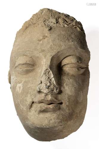 A LIFESIZE FRAGMENTARY GANDHARA STUCCO BUDDHA HEAD, NORTH-WE...