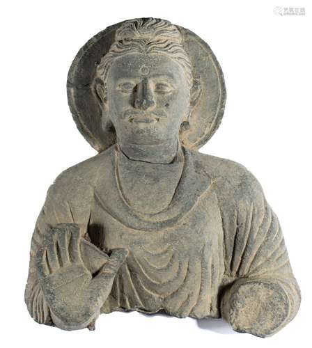 A GANDHARA GREY SCHIST BUST OF BUDDHA, NORTH-WESTERN PAKISTA...