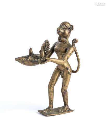 A BRONZE LAMP IN THE FORM OF THE MONKEY GOD HANUMAN, NEPAL, ...