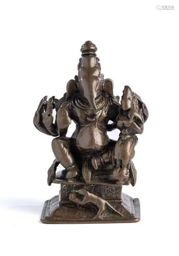 A BRONZE FIGURE OF GANESHA, TAMIL NADU, SOUTH INDIA, CIRCA 1...