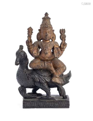 A CARVED WOOD FIGURE OF SKANDA, SOUTH INDIA, CIRCA 1900