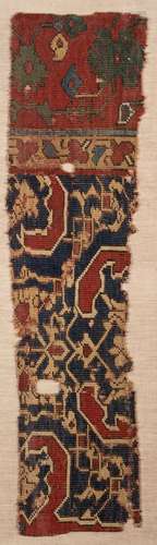 A FRAGMENT FROM A 'STAR' USHAK CARPET, WESTERN ANATO...