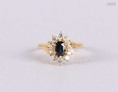 Bague en or 18 carats 750/1000, ornée d'un saphir bleu