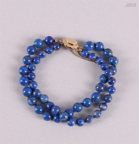 Bracelet à deux rangs de perles de lapis-lazuli avec un