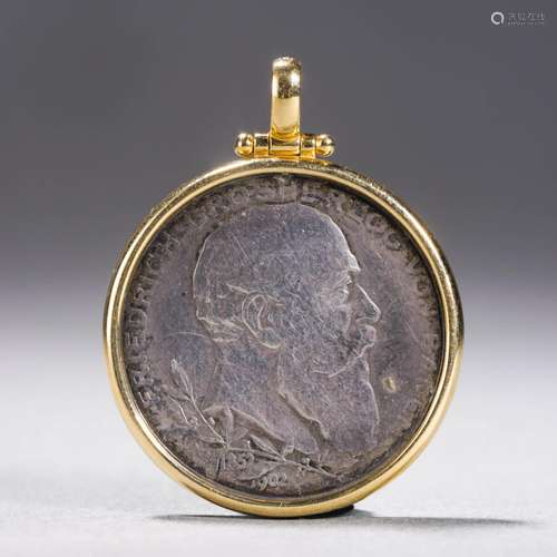 A Silver Coin Mounted in Gold Pendant