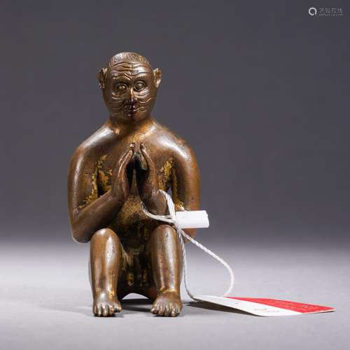 A Bronze Seated Monkey