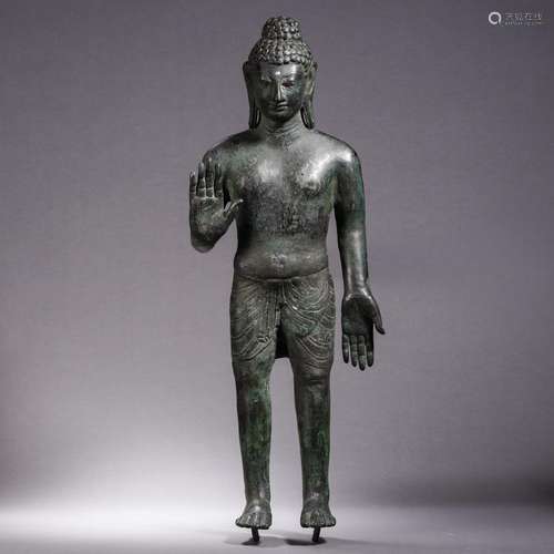 A Bronze Standing Buddha