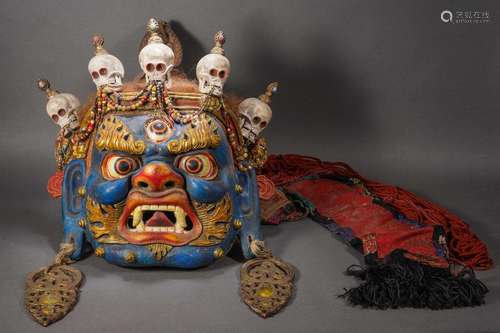 A Polychrome Painted Papier Mache Mahakara Mask