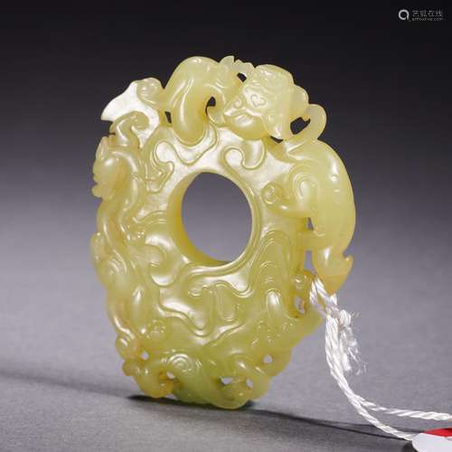 A Carved Yellow Jade Pendant