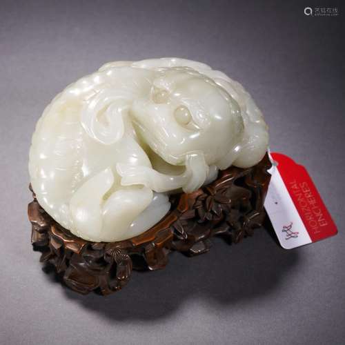 A Carved White Jade Buddhist Lion