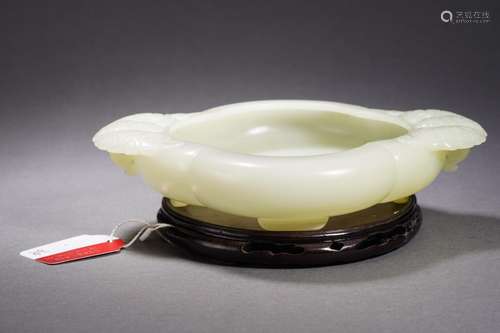 A Carved White Jade Washer