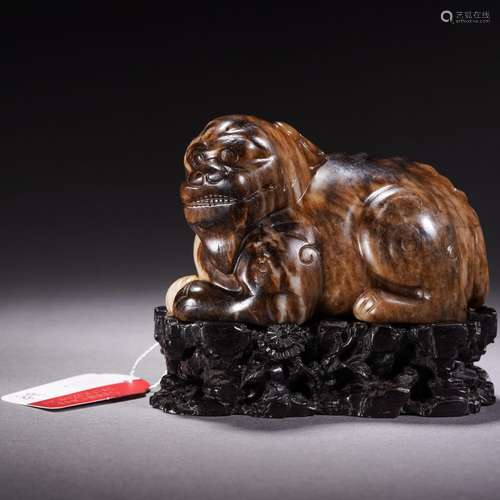 A Carved Tigers-eye Beast Decoration