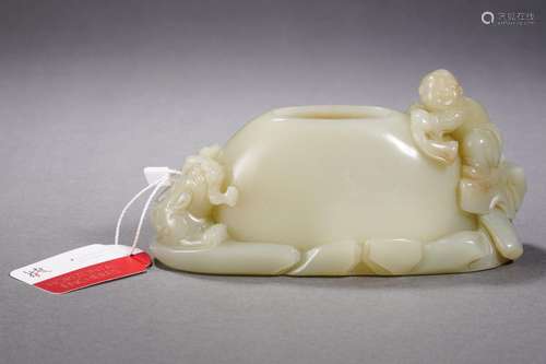 A Carved White Jade Washer