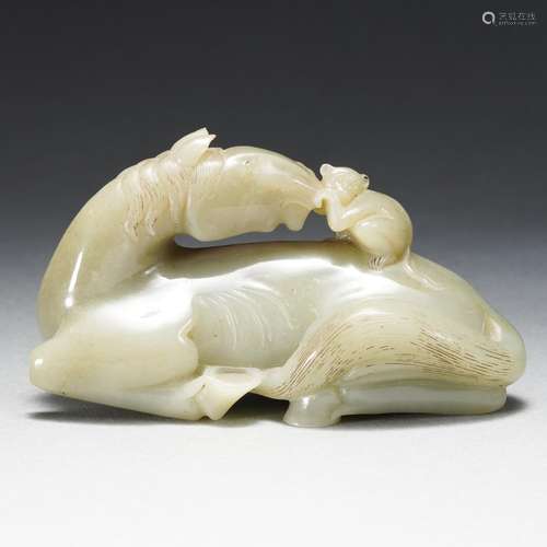 A Carved White Jade Monkey on Horse