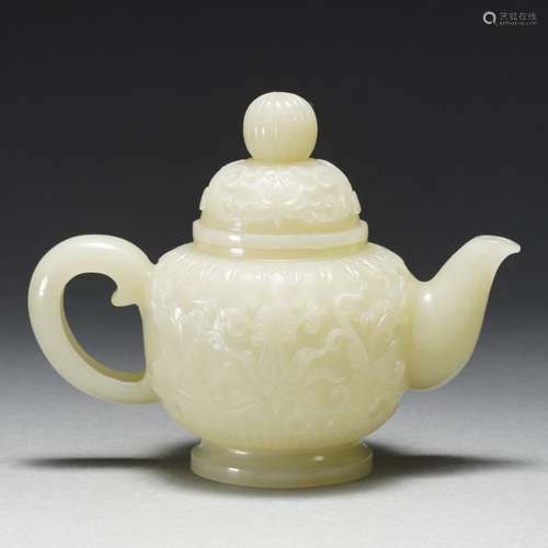 A Carved White Jade Teapot