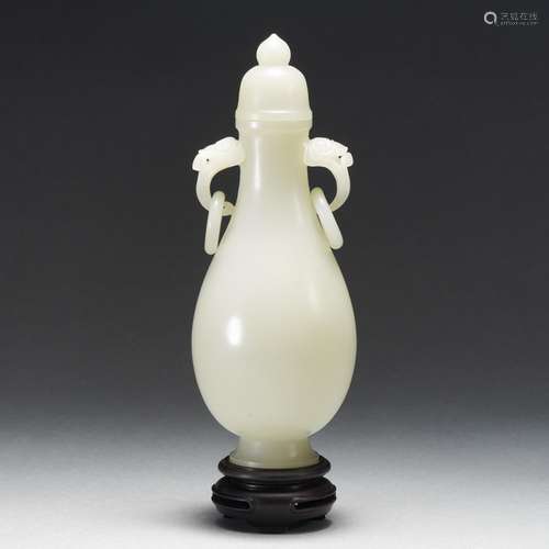 A Carved White Jade Bottle Vase