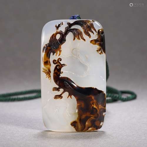 A Carved Agate Phoenix Plaque